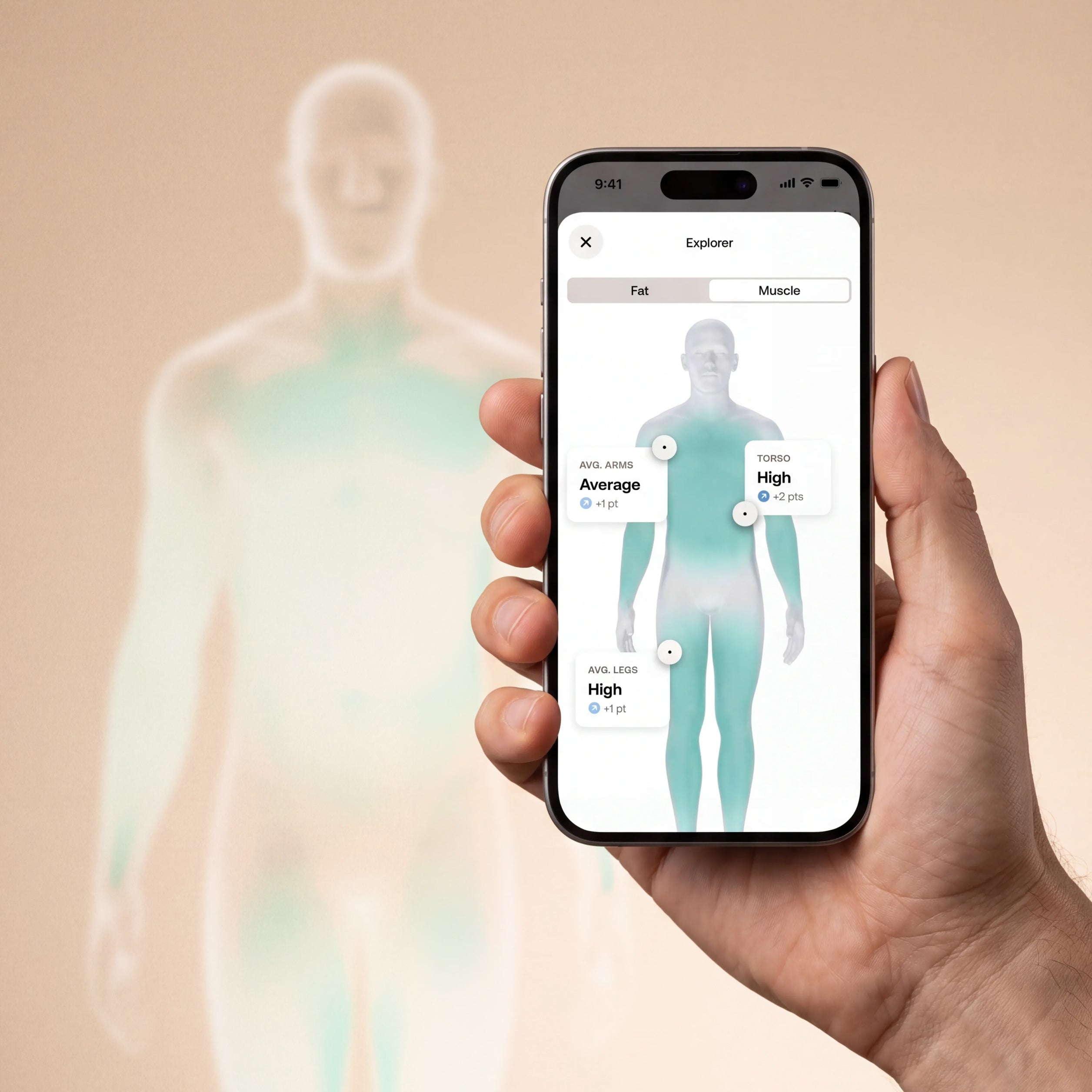 A hand holds a smartphone displaying a fitness app with a human body outline and muscle/fat selection markers, set against a soft beige background with a blurred version of the same body graphic.