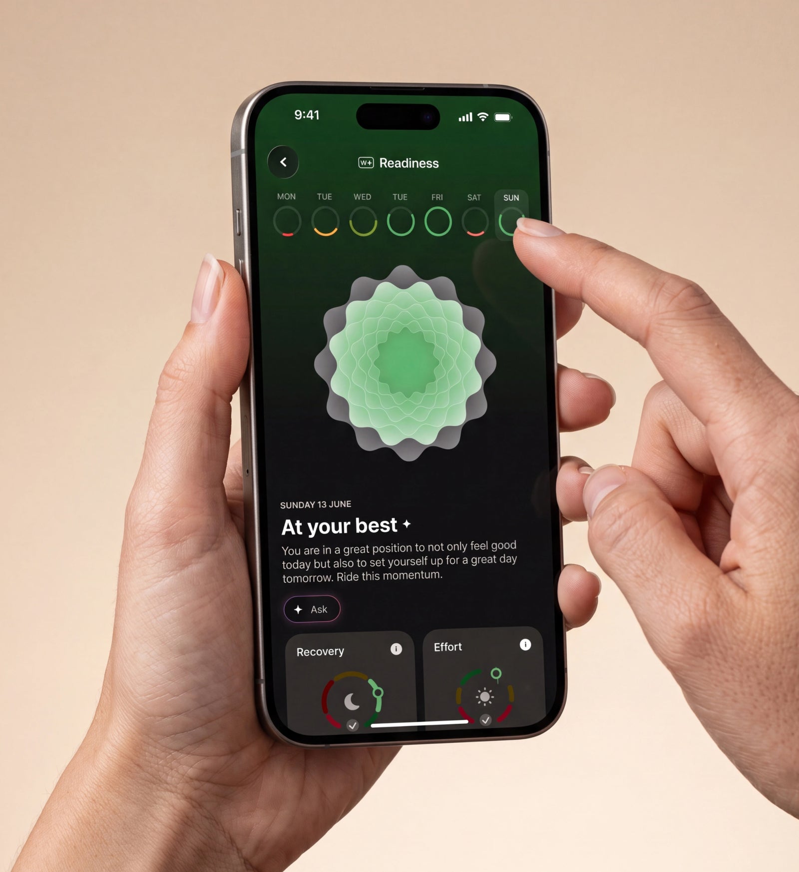 Withings Plus — Readiness Screen — Two hands holding an iPhone showing Sunday June 13 readiness score, green mandala visual, Recovery and Effort metrics — appscreen, hands, beige background