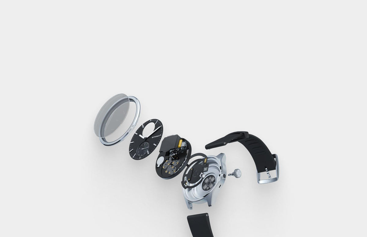 ScanWatch 2 — Black 42mm — Exploded view of internal components on white background, showing crystal, dial, PCB, case and strap — exploded view, technical, components