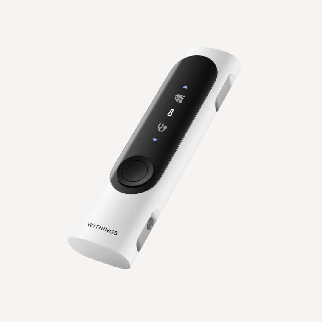 Withings BeamO — Beam-O — Dreiviertelansicht auf weißem Hintergrund, schwarzes Frontpanel mit medizinischen Icons und zentralem Knopf — weiß, schwarz, Dreiviertel, neutraler Hintergrund