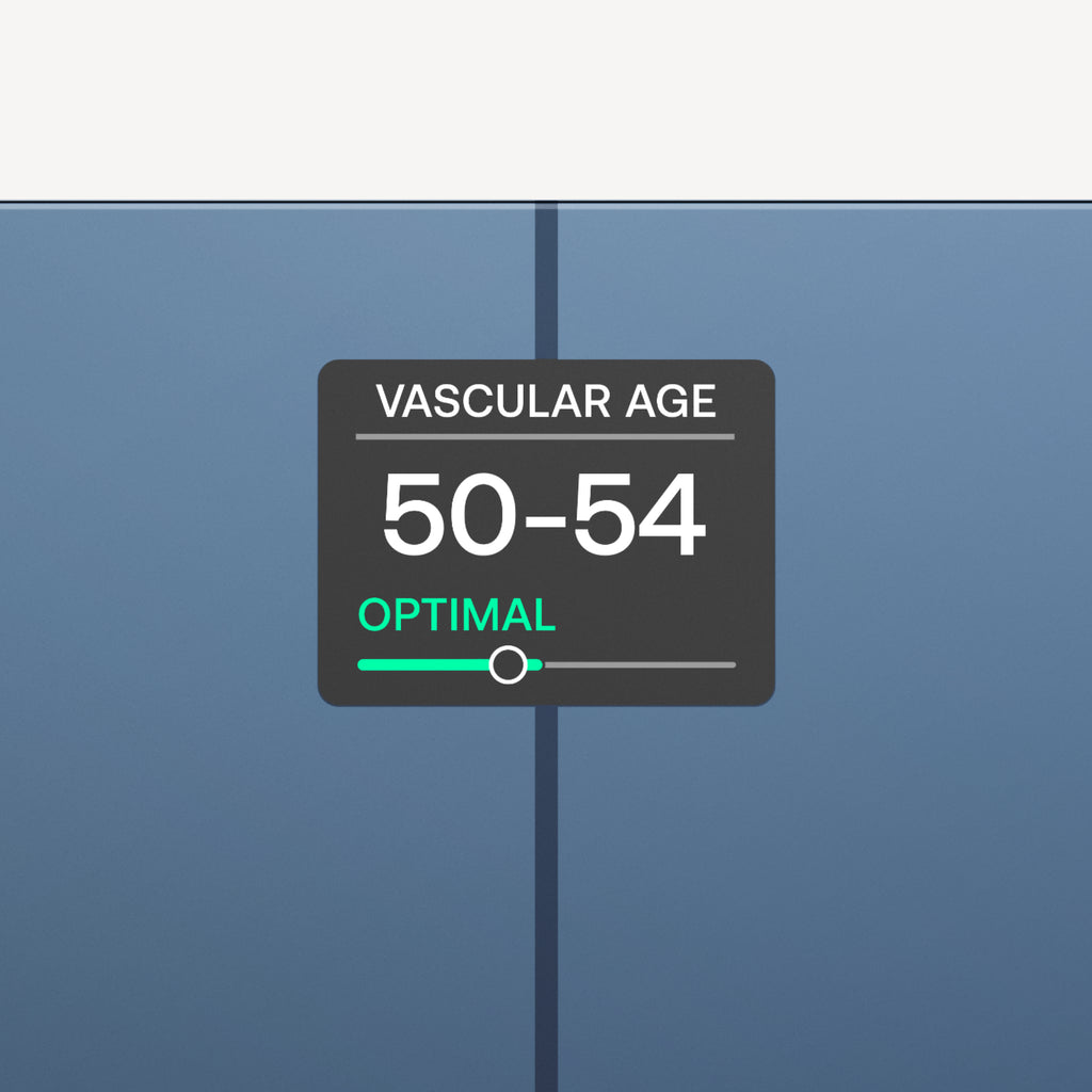 Body Comp — Black — App screen showing vascular age 50-54 with optimal status and green slider indicator — health metric, app UI, vascular age