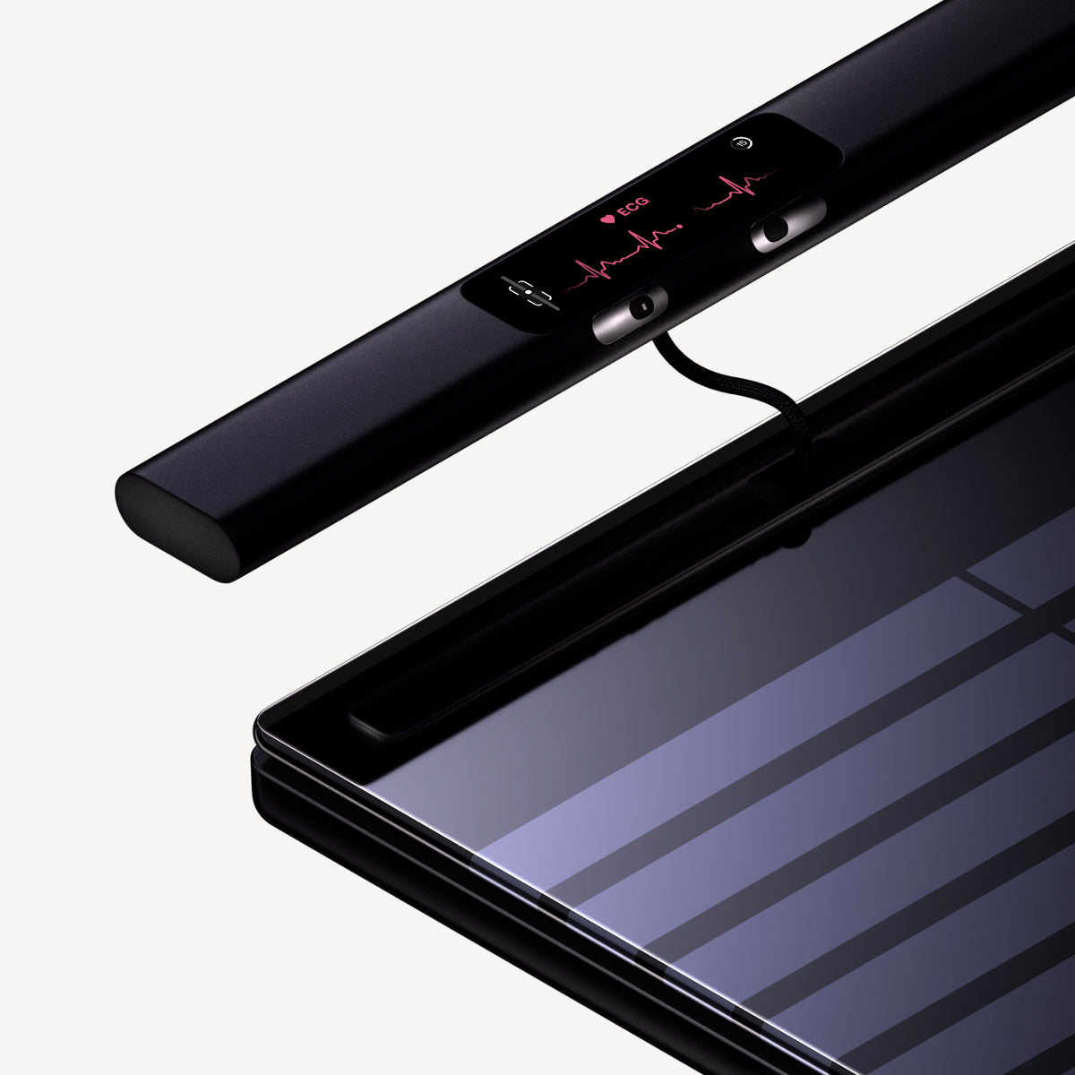 BodyScan 2 — Black — Three-quarter exploded view with detached sensor bar displaying ECG readout on neutral background — exploded view, black, ECG sensor, close-up