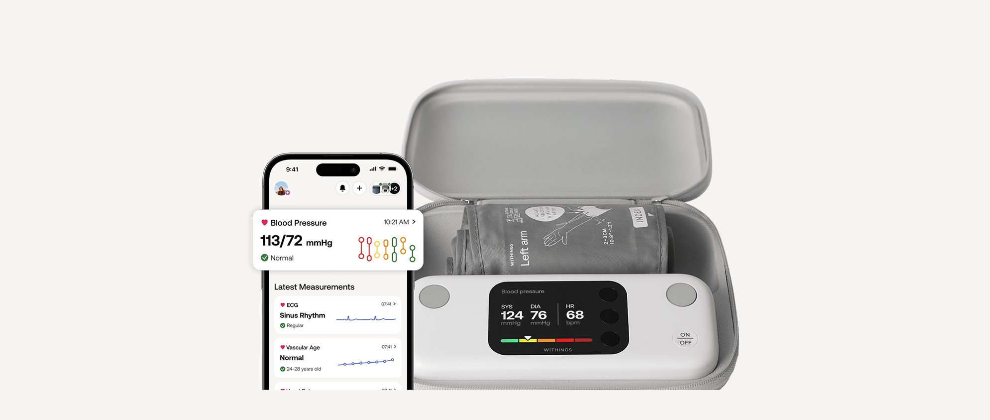 BPM Vision — bpm-vision — Three-quarter view, device in open grey carrying case with cuff, smartphone displaying Health Mate app readings — case, cuff, color screen, app pairing