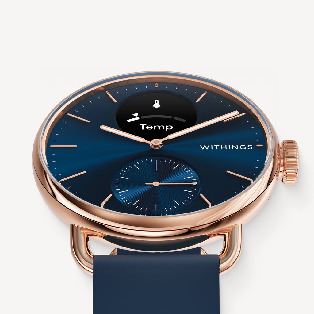 ScanWatch 2 — Blue/Rose Gold 38mm — Three-quarter close-up view, deep blue dial with Temp display, rose gold case, navy silicone strap — three-quarter, close-up, neutral background, blue dial