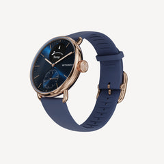 ScanWatch 2 — Blue/Rose Gold 38mm — Three-quarter view on neutral background, deep blue dial with temperature sub-dial, rose gold case, blue silicone strap — three-quarter, blue dial, silicone strap