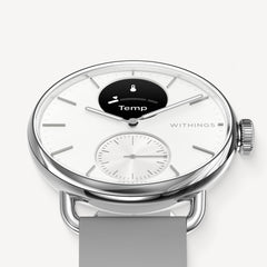 ScanWatch 2 — Bianco 38mm — Primo piano in tre quarti, quadrante bianco con mini-display Temp, cinturino grigio, cassa argento — tre quarti, sfondo neutro, temperatura, ibrido