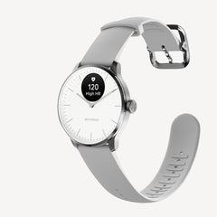 ScanWatch Light — Blanco 37mm — Vista en tres cuartos sobre fondo blanco, esfera analógica con pantalla AMOLED mostrando alerta de FC alta de 120 LPM, correa de silicona gris — tres cuartos, fondo blanco, plateado gris