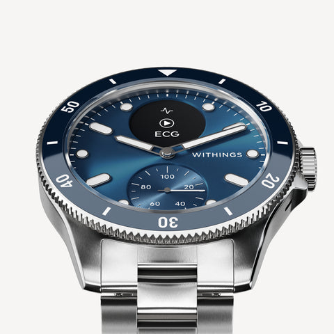 ScanWatch Nova — Blue 42mm — Three-quarter view, navy blue dial with ECG display, stainless steel case and metal bracelet — three-quarter, neutral background, dial detail