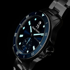 ScanWatch Nova 42mm Blue — Blue variant — Three-quarter view on black background, glowing cyan lume dial, Sleep Score 75 displayed — three-quarter, dark background, lume dial
